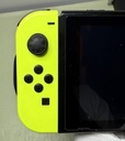 Nintendo Switch Neon Yellow Bundle w/ 4 Games + Mario Odyssey Case & Charger at best price