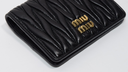 Miu Miu Matelasse Textured Leather Wallet Black cost
