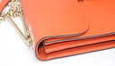 Gucci Leather Interlocking G Medium Shoulder Bag in the color Sun Orange cost