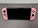 Nintendo Switch OLED Model Handheld Gaming Console w/controllers, charger, case price