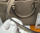 LV OnTheGo MM Bicolor Monogram Empreinte Leather M45607 Turtledove color buy