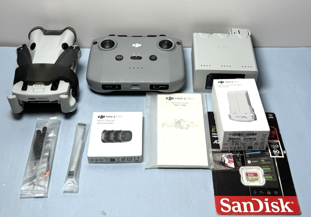 DJI Mini 4 Pro Drone Kit – Never Flown, 2 Batteries, Filters, SD, More