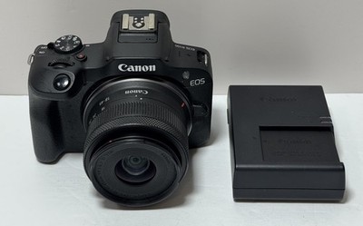 [11392-1] Canon EOS R100 w 18-45mm f/4.5-6.3 IS STM w/charger and battery