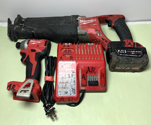 [9539-1, 9539-4] Milwaukee 3650-20 M18 18V 1/4" Driver + 2720-20 M18 Saw w 5.0 Ah batt+ charger
