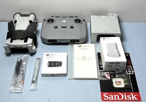 DJI Mini 4 Pro Drone Kit – Never Flown, 2 Batteries, Filters, SD, More